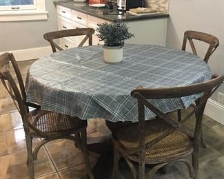 Brand new Restoration Hardware table and chairs.