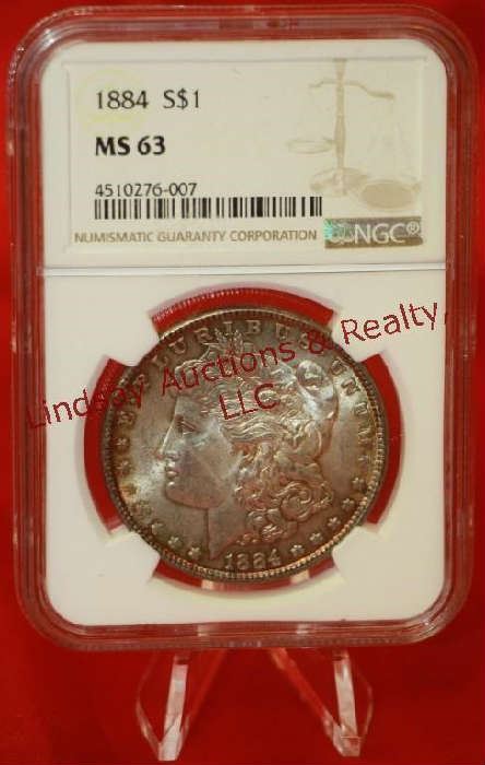 10 - 1884 US Silver Morgan Dollar Graded MS63 
