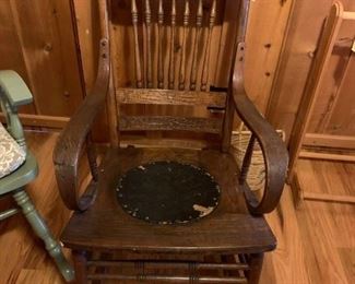 #21 wood carved arm rocker $60.00