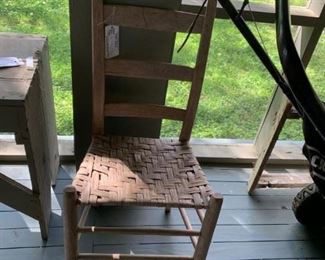 #38 ladder back chair woven seat old $30.00