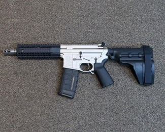 LOT # 14 - BLACK RAIN "FALLOUT 15"                                          AUCTION ESTIMATE - $1,900.00 - $2,300.00                                                             NP3 SILVER FINISH, BILLET UPPER & LOWER RECEIVER, STAINLESS  BARREL AND FLASH HIDER, SIG PISTOL BRACE, TIMNEY TRIGGER, ANTI-ROLL PINS, THIS TRICKED OUT COMPACT BEAUTY IS NEW IN BOX