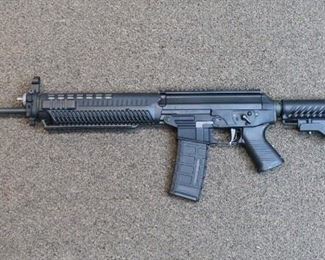 LOT # 5 - SIG-SAUER "SIG 556" RIFLE                                               AUCTION ESTIMATE - $1,100.00 - $1,600.00           CALIBER 5.56, CONDITION IS LIKE NEW, 1ST GENERATION, GAS OPERATED WITH ADJUSTABLE GAS LEVER, COLLAPSIBLE STOCK, AMBI SELECTOR, PICATINNY RAIL WITH 1 MAG.