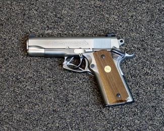 LOT # 38 - SEECAMP/COLT 1911 COMMANDER                 AUCTION ESTIMATE - $2,200.00 - $2,500.00                                              CALIBER .45ACP, ONE OF APPROXIMATELY 2000 DOUBLE ACTION SEECAMP CONVERSIONS BY WILLHAM & LARRY SEECAMP IN MILFORT, CONN DURING THE MID 70s, NICKEL FINISH, COLT FACTORY GRIPS, CONDITION IS VERY GOOD