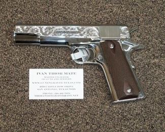 LOT # 60 - CUSTOM COLT 1911 GOVERNMENT MODEL                                                                                 
AUCTION ESTIMATE - $3,000.00 - $3,500.00                                 CALIBER 38 SUPER, HAND ENGRAVED BY IVAN MATE, HIGH POLISHED STAINLESS STEEL, WHITE DOT SIGHTS, TWO FACTORY MAGAZINES, SIMPLY EXQUISITE PISTOL