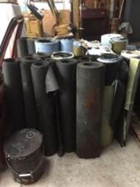 Assorted Rolls of Roofing Supplies
