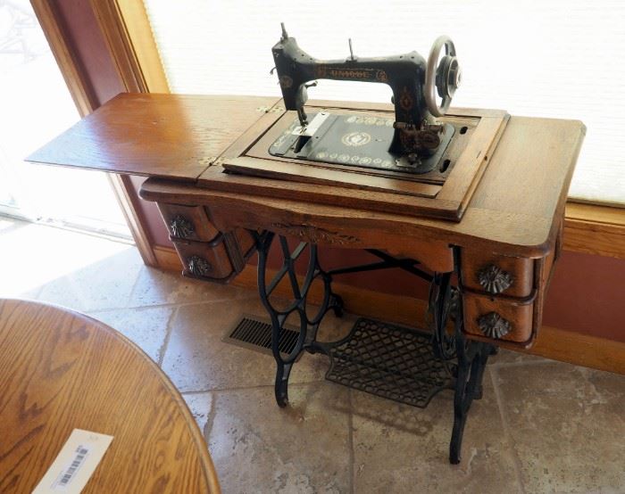 Unique Antique Pedal Driven Sewing Machine With Wood Cabinet