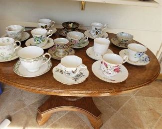 Teacups and oak coffee table