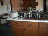 Pots, pans, kitchen cabinets