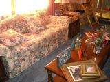 Floral sofa, loveseat and tables