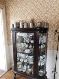 china cabinet,pewter mugs, three sets of china