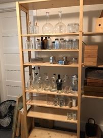 more shelving from Skandia, storage containers, collectible bottles and baskets