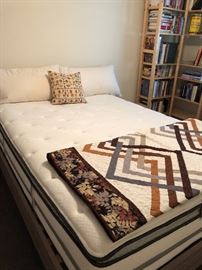 Another queen bed for sale along with a handmade quilt.   Bed frame is hidden behind the cushions -  Simple wooden frame measures 64"w x 89"l x 39.5" high  asking $160 