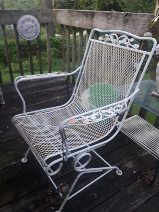 wrought iron patio chair, round table, etc.