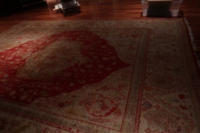 Several large area rugs