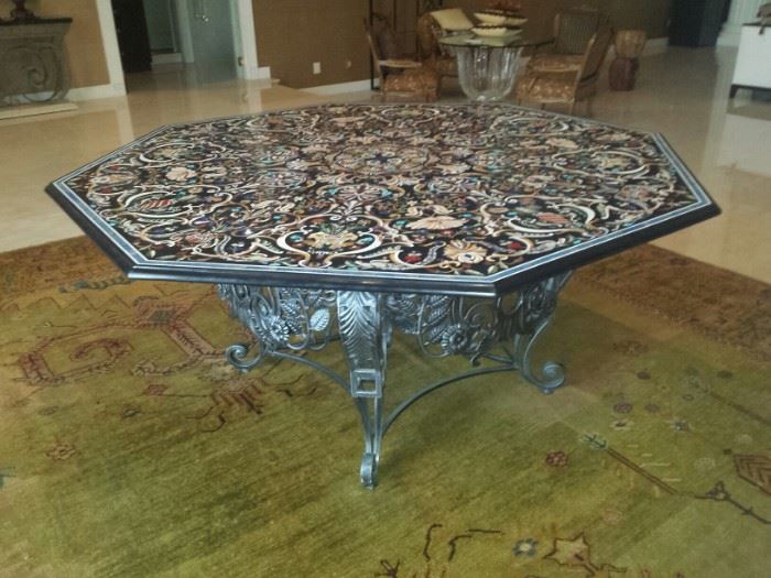 Inlaid table of multiple stones including Lapis Lazuli.