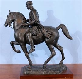 192a  Heavy cast iron horse and Roman soldier rider, 20 in. T, 13 in. W, 6 in. D.