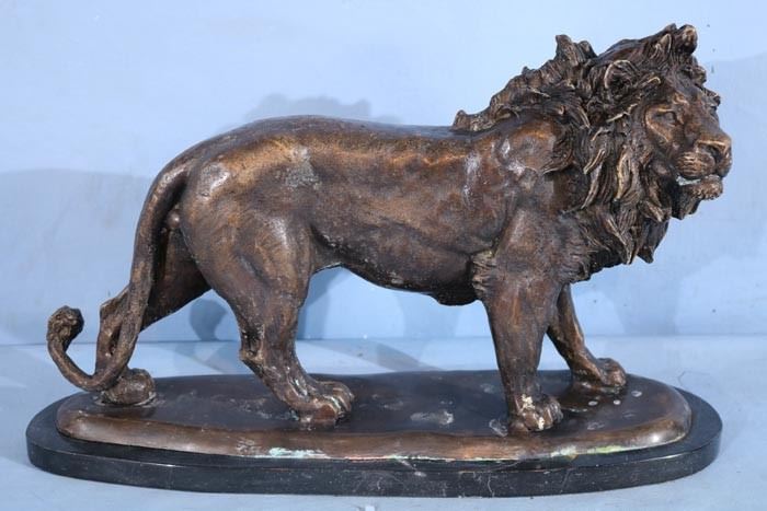 302a  Bronze lion on marble base, 12 in. T, 19 in. W, 6.5 in. D.