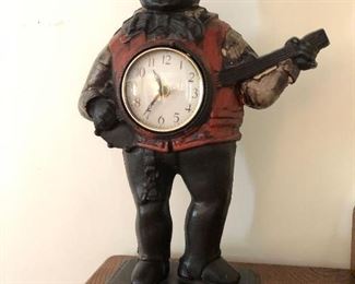 Cast iron clock musician/banjo player Waterbury?