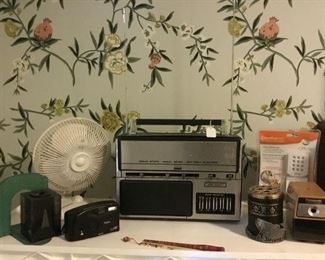 Fan,pencil sharpener, camera, pencil holder