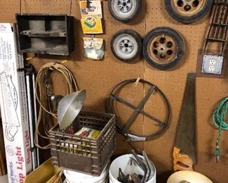 rope bucket, steel tape rooter, plastic parts bins, 4' shop bulbs, tool caddy, hand saw
