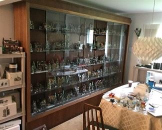 ALSO FOR SALE IS THE  CUSTOM LIGHTED WOOD  DISPLAY CASE w/ 4 SLIDING GLASS PANELS, GLASS SHELVES, LOCK & KEYS.  123" ACROSS  88" TALL  17" DEEP.  NEXT 4 PICTURES SHOW EACH PANEL W/DEPT 56 CHRISTMAS VILLAGES  and ACCESSORIES