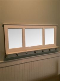 61. Mirrored Wall Shelf