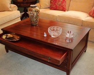 Large Wood Coffee Table with Three Drawers on Each Side by Safaavieh with Decorative Vase and Bowls