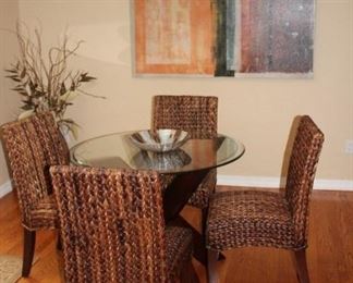 Small Round Table with Glass Top and Woven Rattan Chairs