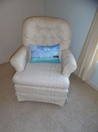 Ivory upholstered, rocker/swivel chair