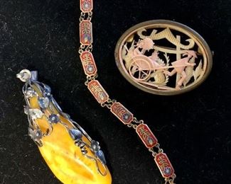 Amber pendant, enamel bracelet and pin