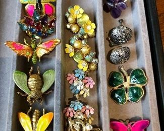 Butterflies,  pins, and vintage earrings