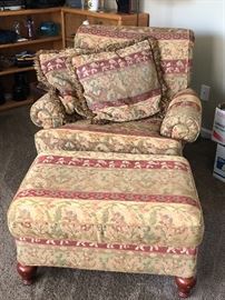 Upholstered chair with ottoman