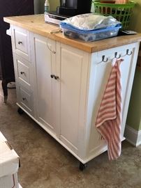 Kitchen island with drawers, and cabinet door