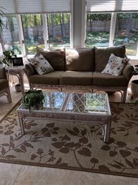 Very nice wicker sofa, chairs and table with very nice sisal rug