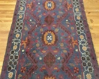 6' 3" x 3' 5" area rug