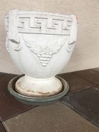 There are 2 of these cement outdoor planters