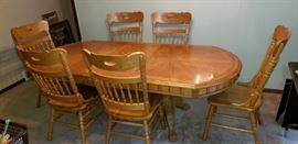 Oak Dining Claw Foot Table with 6 heavy chairs.