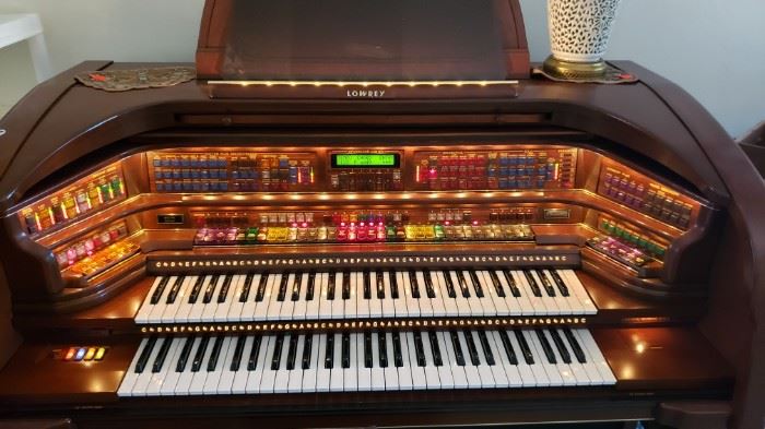 Lowey electronic organ that works!  Awesome piece priced to sell!! She paid over 20k for it. You can get it for a steal. 