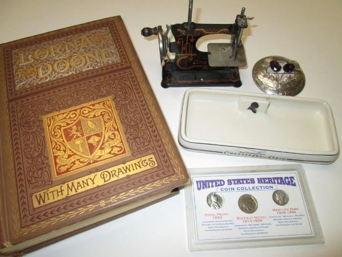 Toy sewing machine, railroad matchholder.