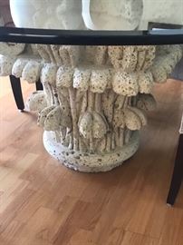 Coral rock dining room base.  Glass top is 68” beveled with 6 upholstered cream color woven chairs 