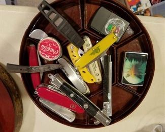 Assorted knives and lighters