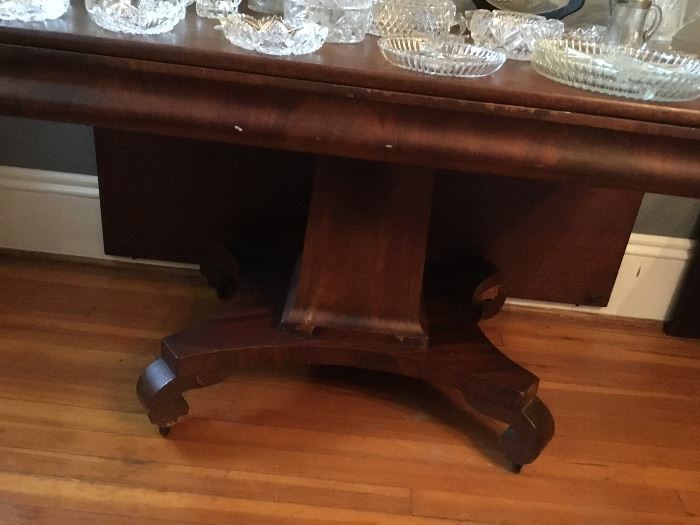 One of a. Pair of antique drop leaf table. Combined with it’s twin, they make a large banquet table. Priced separately.