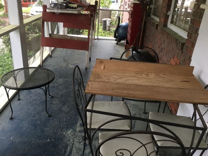 Back porch with lots of stuff from the basement