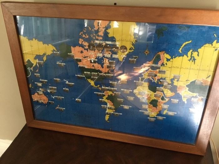 Neat vintage world clock showing times all around the world.