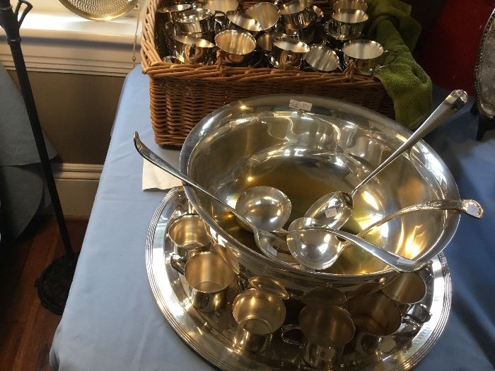A caterer’s dream: a silver plate punch bowl, extra ladles and enough handled punch cups for a plethora of guests!