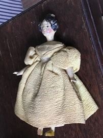Antique carved articulated doll