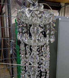 #40 - Swarovski Crystal chandelier - this is massive at over 3 feet tall with a whopping 18 lights! Pictures do not do it justice. The crystals are magically beautiful! When you see this in person, you can tell these are not ordinary chandelier crystals. Upon further research, we believe this chandelier is actually made by King's Chandelier Company in North Carolina, and not Schonbek as previously stated. It is their "King" model, which can still be purchased for $8,279! They use Swarovski crystals and you can purchase replacements for the missing ones on their website.