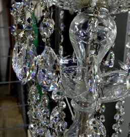 #40 - Swarovski Crystal chandelier - this is massive at over 3 feet tall with a whopping 18 lights! Pictures do not do it justice. The crystals are magically beautiful! When you see this in person, you can tell these are not ordinary chandelier crystals. Upon further research, we believe this chandelier is actually made by King's Chandelier Company in North Carolina, and not Schonbek as previously stated. It is their "King" model, which can still be purchased for $8,279! They use Swarovski crystals and you can purchase replacements for the missing ones on their website.