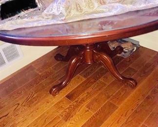 WOODEN OVAL TABLE WITH CURVED LEGS