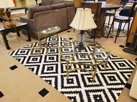The glass tables on this rug are hard to see - but they are in great condition and would accent a room well.